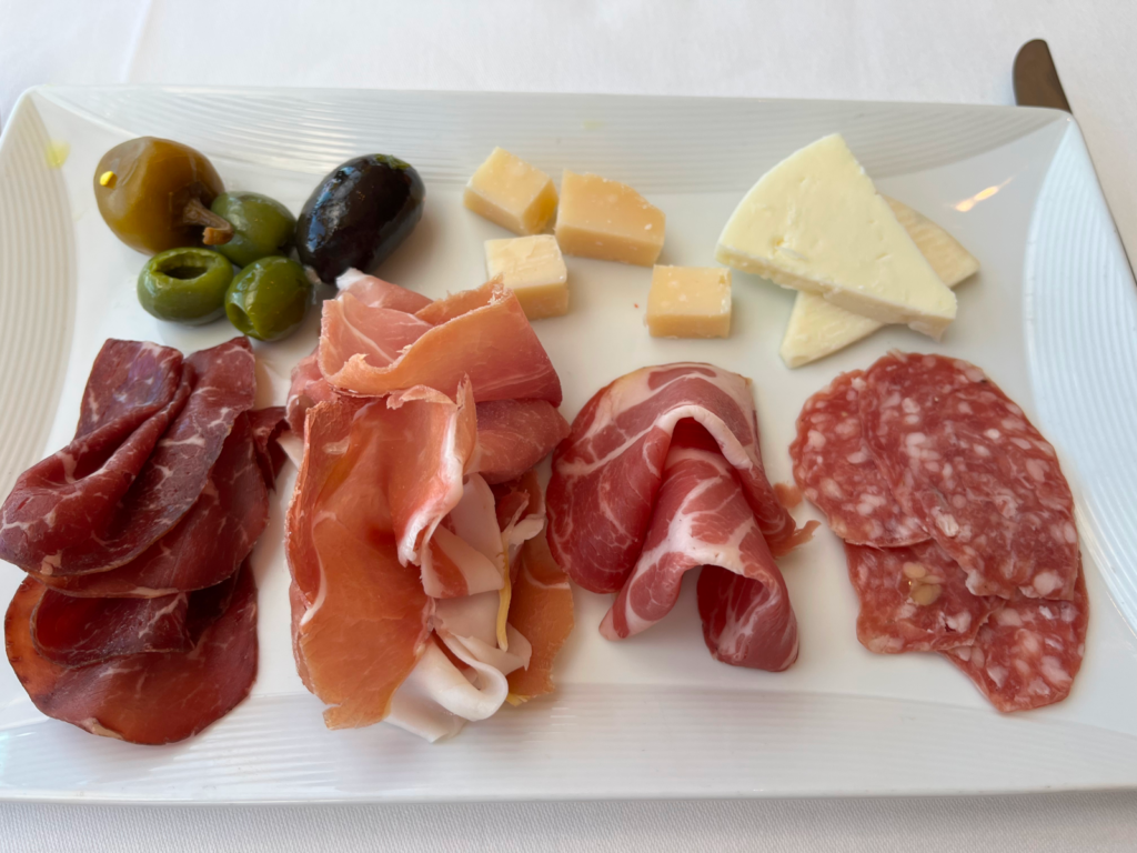 Sliced Prosciutto, Sliced Coppa, Sliced Bresaola, Salame Gentile, Marinated Cerignola Olives, Roasted Garlic, Caciotta a Tartufo, Parmigiano-Reggiano and Sweet Pepperdew